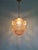 Art Deco pendant light in pale pink pressed molded glass with a chrome-plated metal frame, circa 1920-30. Pretty floral...
