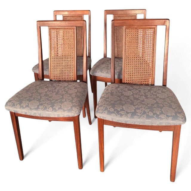 This set of vintage teak dining chairs offers timeless style and lasting comfort, perfect for enhancing your dining room...