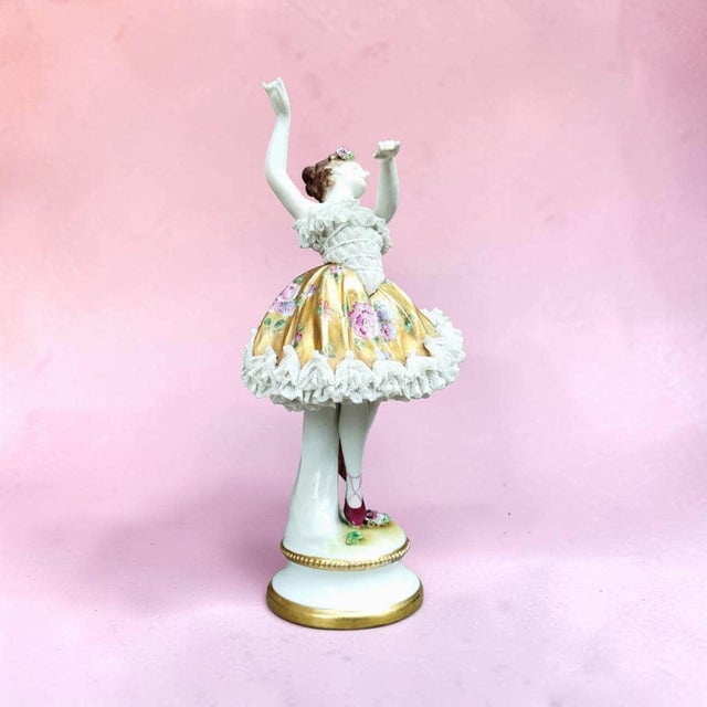 - Porcelain ballerina figurine with porcelain lace tutu and bodice - Gilt tutu hand-painted with flowers, applied flowers...