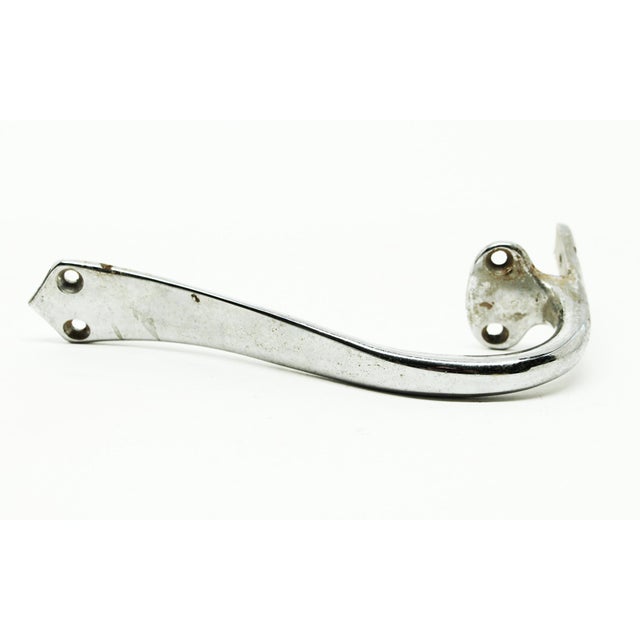 Brass furniture and cabinet pulls with a chrome finish. Some wear from age. The original mounting screws are not...