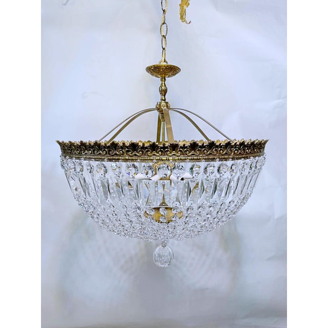 This is very decorative basket chandelier with decorative brass frame and A-chain. Rewired and restored and it has 6...