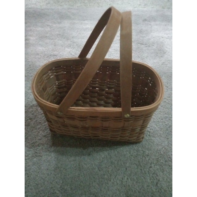 GORGEOUS Handmade 9"X12" Woven Basket Handbag This GORGEOUS handmade 9"X12" woven basket handbag by features a top handle...