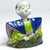 Decorative, oriental porcelain figurine made of white bisque porcelain. The head is placed on a pole and a counterweight...