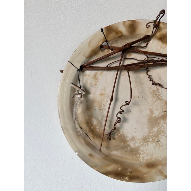 Unique 1980’s mixed media ceramic wall plate by artist Christopher Darling. This handcrafted decorative piece features an...