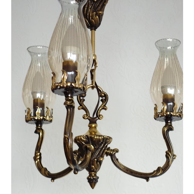 Art Deco Brass and Glass Chandelier by Bruno Chiarini, 1940s, in Very Good conditions. Designed 1920 to 1949 This piece...