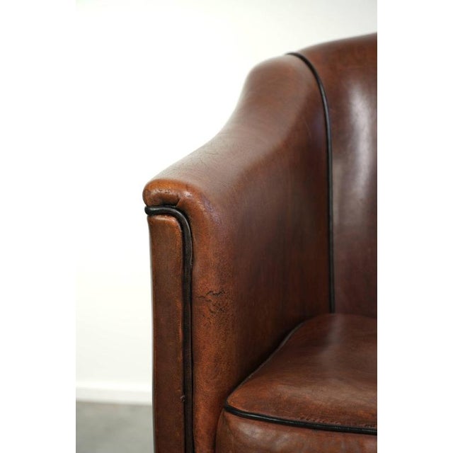 Sheepskin Armchair in a Deep Brown Color Finished with Black Piping For Sale - Image 10 of 13