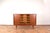 This teak highboard model 13 was designed in the 1960s by Gunni Omann and manufactured by Omann Jun. The furniture has...