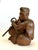 This is a depiction of a monkey dressed in monk's robe and carring a staff made of iron. In Japanese art, monkeys...