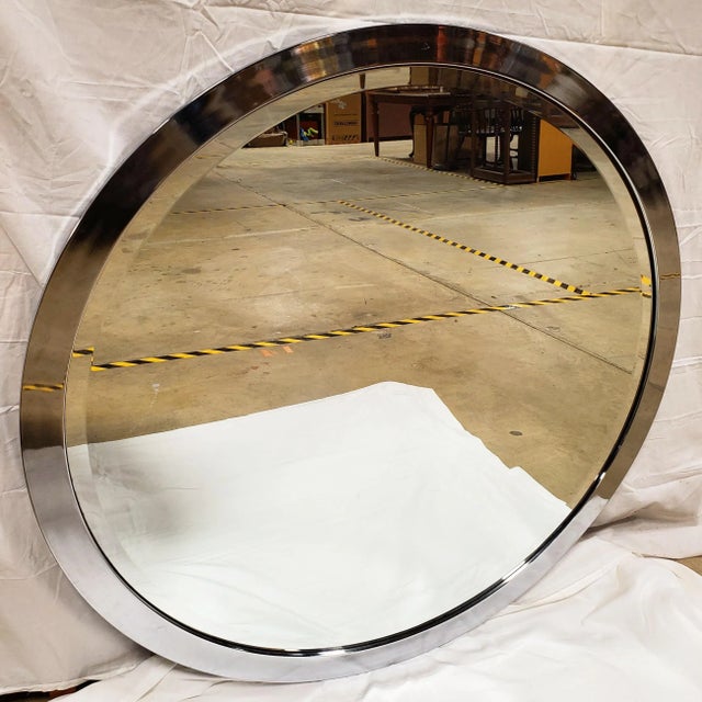 Post Modern Memphis Style Wall Mirror By Kaizo Oto For DIA. In a Stunning Polished Stainless Steel Frame. 40.5" diameter....