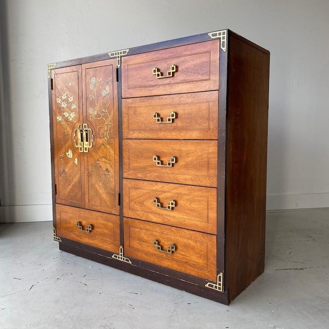 Genuine Bassett chinoiserie inspired armoire wardrobe is in beautiful vintage condition. The top and all black details...