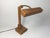 Desk lamp from "KK Création" made of solid wood from the '70s. Thanks to the gooseneck, the lampshade can be adjusted to...