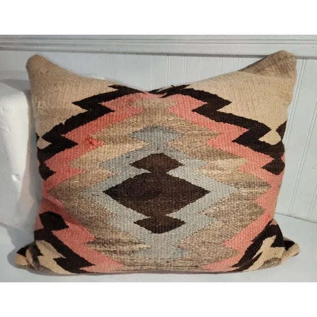 Early 19Thc hand woven pillows in unusual colors of salmon,tan & brown with light blue centers.The back is in a soft wool...