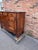 This exquisite antique sideboard is a true testament to the elegance and craftsmanship of French furniture from the 18th...