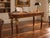 A striking vintage writing desk by Maitland-Smith, retaining its original brass maker’s plaque. The desk combines richly...