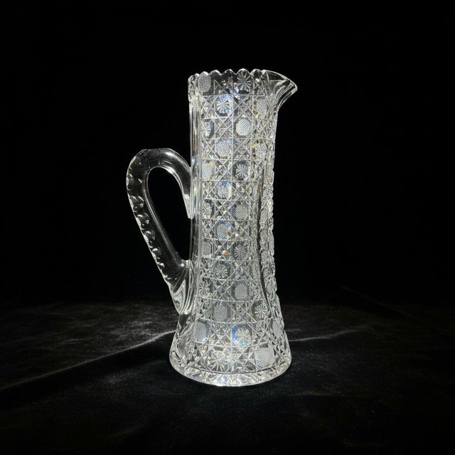 Hand-cut during America's Brilliant Period (1876-1916), this elegant American Brilliant Period (ABP) crystal pitcher...