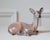 An exquisite porcelain deer by Danish sculptor Dahl Jensen, celebrated for his masterful naturalism and refined...