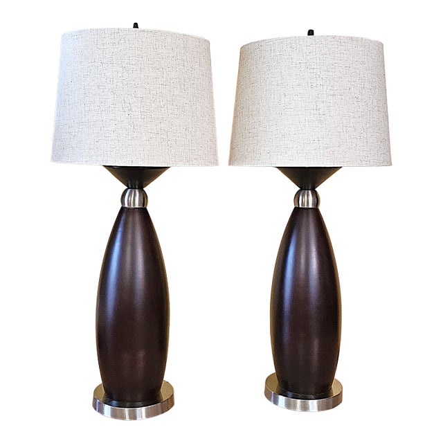 Pair of Contemporary Espresso Wood Hourglass Lamps With Brushed Nickel Accents and Linen Shades For Sale