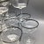 Set of 11 platinum rim champagne crystal coupes/sherbet glasses with raised “France” lettering on the bottom.