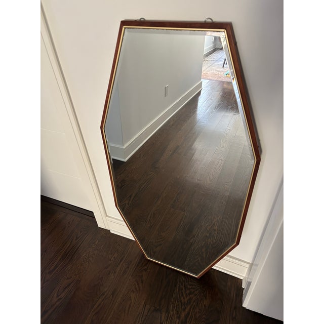 Stunning 1950's large brass and walnut large octagonal wall mirrors.