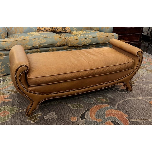 Vintage leather ottoman with rolled arms by Century Furniture, no longer in production. Great style and all nail heads...