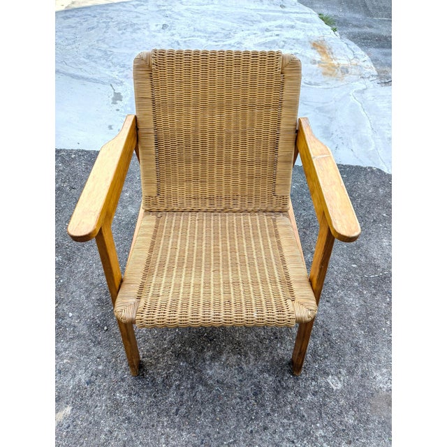 Unknown armchair from the 1960s, in used condition. The armchair is very comfortable and can be easily disassembled. It...