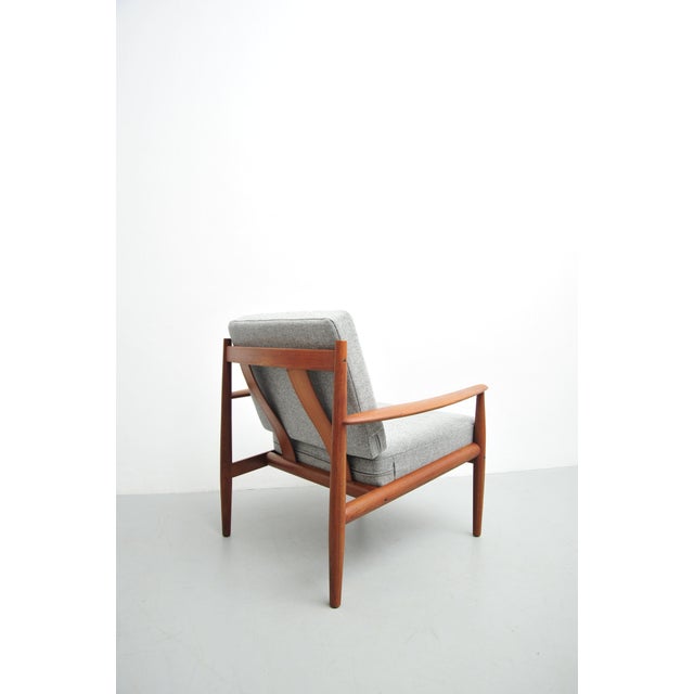 Lounge chair by Grete Jalk in teak with loose cushions. The cushions and foam have been replaced and are in very good...