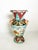A Rococo-style ceramic vase from Monaco, made in France in the 1970s. This spectacular decorative piece is distinguished...