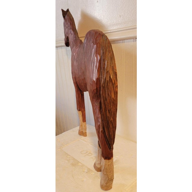 Hand carved folk art wood horse and signed by the artist.Signed by the artist Neil Korpinen and dated in the 1980's.Looks...