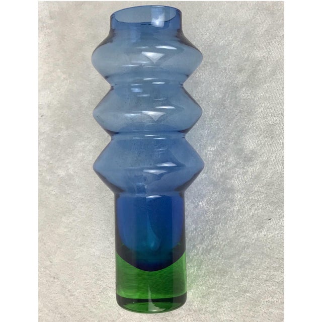A striking example of mid-century Scandinavian art glass, this authentic hooped vase (Pattern B5/605) was designed by...