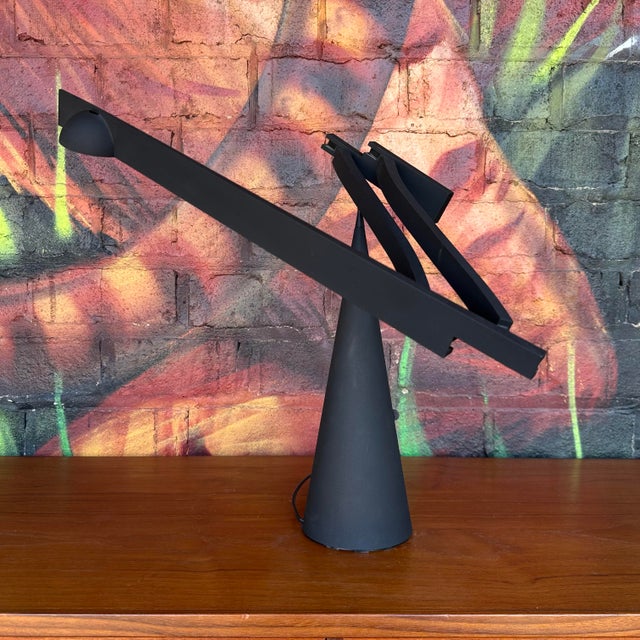 This gorgeous Tabla table lamp was designed by Mario Barbaglia and Marco Colombo for Italiana Luce. This sculptural design...