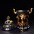 This impressive vessel is masterfully crafted from heavy solid copper/bronze and adorned with vibrant cloisonné enamel...