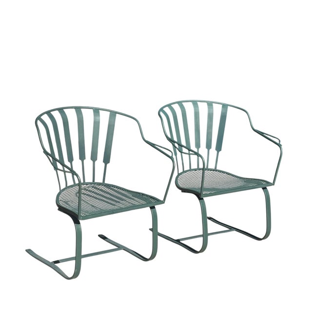 Iconic mid-century style outdoor vintage 1950s wrought iron bouncer lounge chairs. Finished in the celebrated "Pinecrest"...