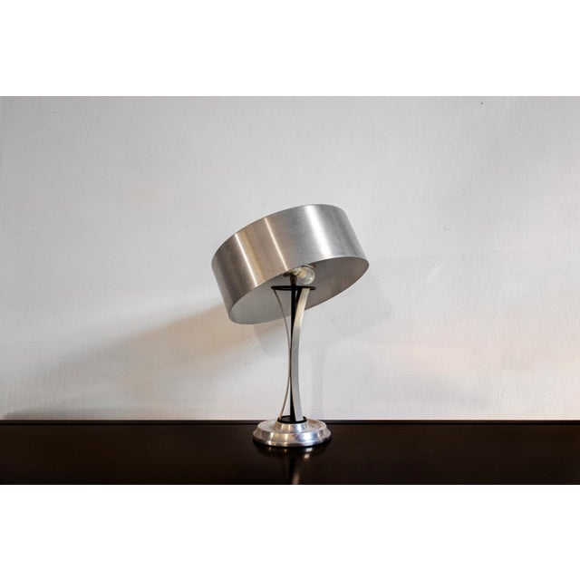 Adjustable table lamp with nickel structure and glass diffuser. Designer Oscar Torlasco Lumi producer 1960s I have...