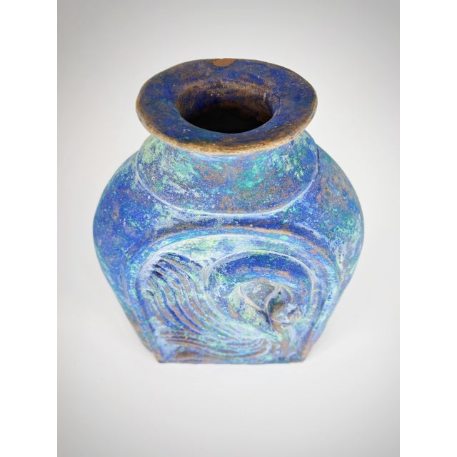 A dramatic, hand-built clay vase with bold painterly surface and sculptural presence. This large studio pottery vessel...