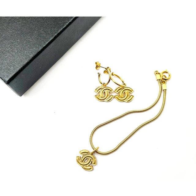 Chanel Vintage Gold Plated Popped CC Earrings Bracelet Set *Marked 01 *Made in France *Comes with the original box...