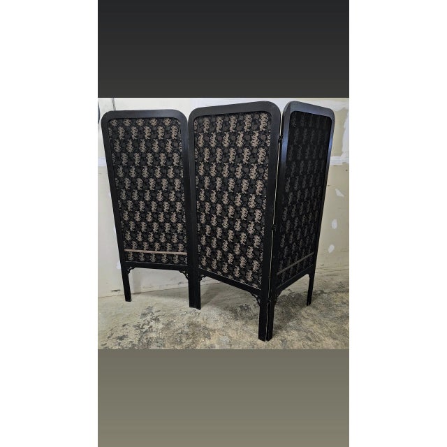 1950s Black Dragon Chinoiserie screen with ivory yang dragons in an allover field design juxtaposed with ivory yin mums....