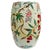 A vibrant vintage Famille Rose porcelain garden stool featuring a lush, hand-painted botanical scene of ripening lychees...