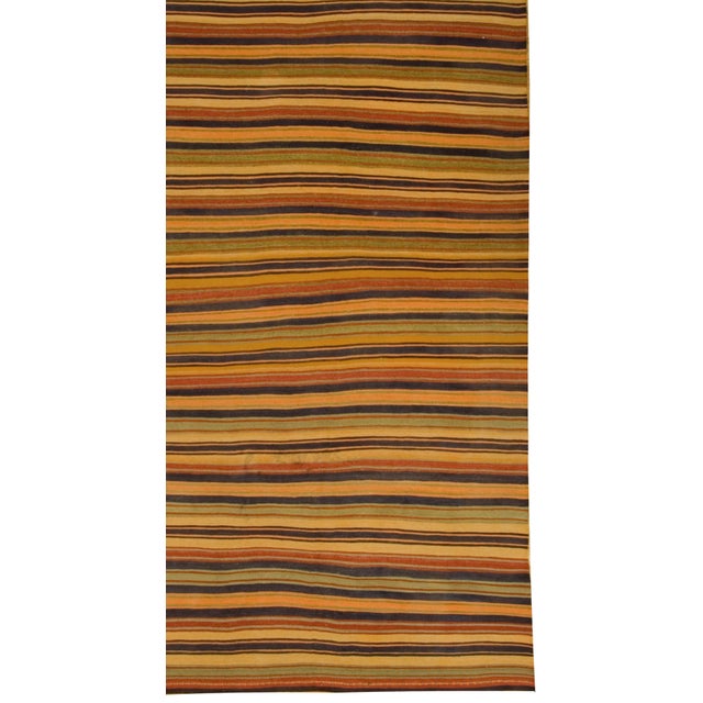 Vintage striped Turkish kilim handwoven in the 1940s. Colors: gold, orange, multi