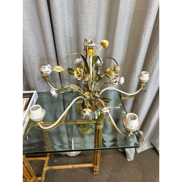 Vintage handmade in Italy, made of tole with a beautiful design of flowers and leaves five arm chandelier.