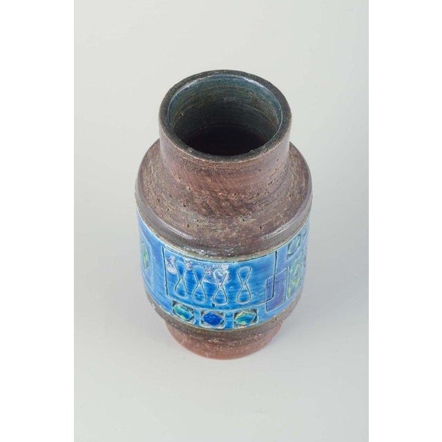 Aldo Londi for Bitossi Vase, 1970s. Cylindrical stoneware vase with rustic brown glaze and a decorative band in the...