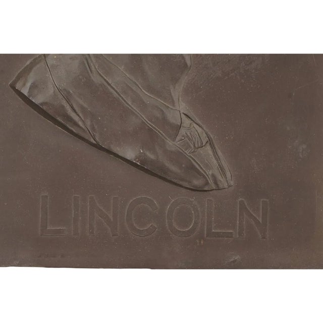 An antique American metal octagonal plaque depicting a relief portrait of George Washington. Circa the 19th century. It is...