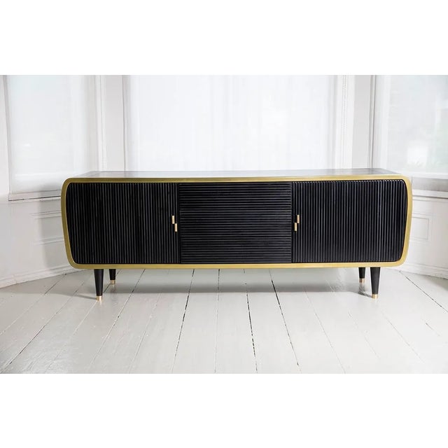 This beautiful limited edition piece consists of blackened oak and brass, with drawers lined in Alcantara fabric. It is a...