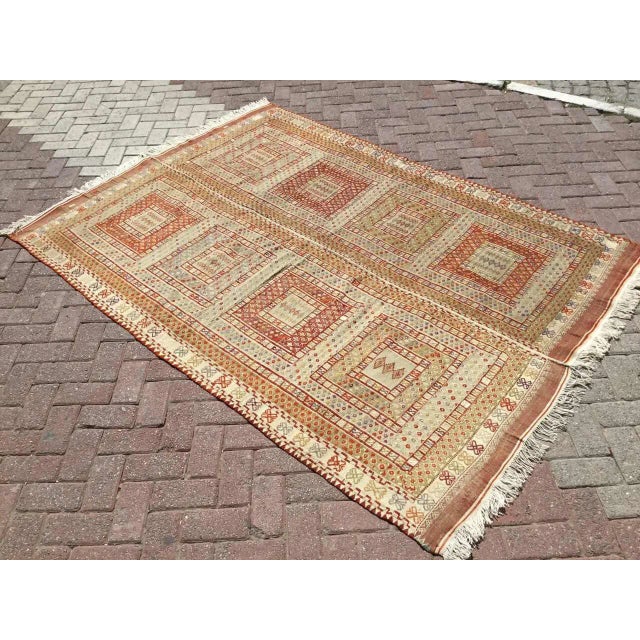 This beautiful, vintage, handwoven kilim is approximately 60 years old. It is handmade, of very fine quality hand spun...