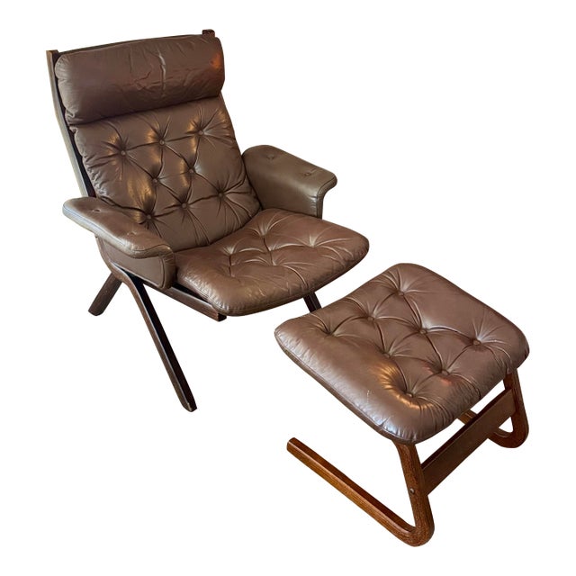 A Beautiful Vintage Danish Norwegian Attributed to Ekornes “Uno” Lounge Chair With Stool in a Brown Leather, Circa 1970s. For Sale