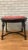 Antique Ebony Stool Bench with Nail Head Finish This antique ebony turned leg foot stool bench with nail head finish is a...