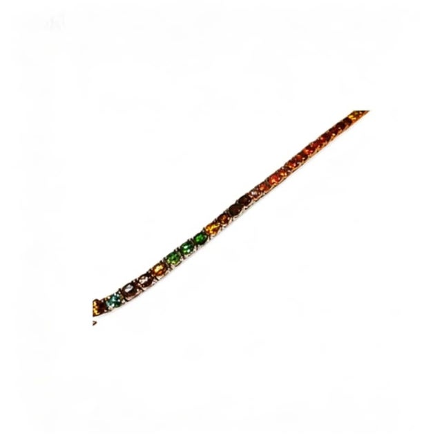 This sterling silver .925 flexible bracelet features numerous natural oval multi-color tourmalines , offering vibrant...