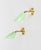 Marvelous and rare pair of sconces in brass and pistachio green enameled metal. Completely original and in amazing...