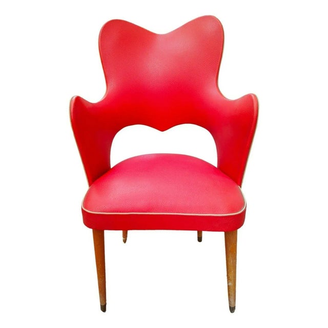 Splendid two-tone armchair, early 1950s, design often attributed to Gastone Rinaldi, made on wooden frame with wraparound...