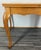 This elegant Vintage French Louis dining table is a beautifully proportioned piece, showcasing a warm oak finish with a...