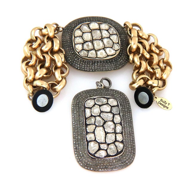 This lovely bracelet and pendant are from Suzy T Designs, the bracelet is a large cushion shape centerpiece with sliced...